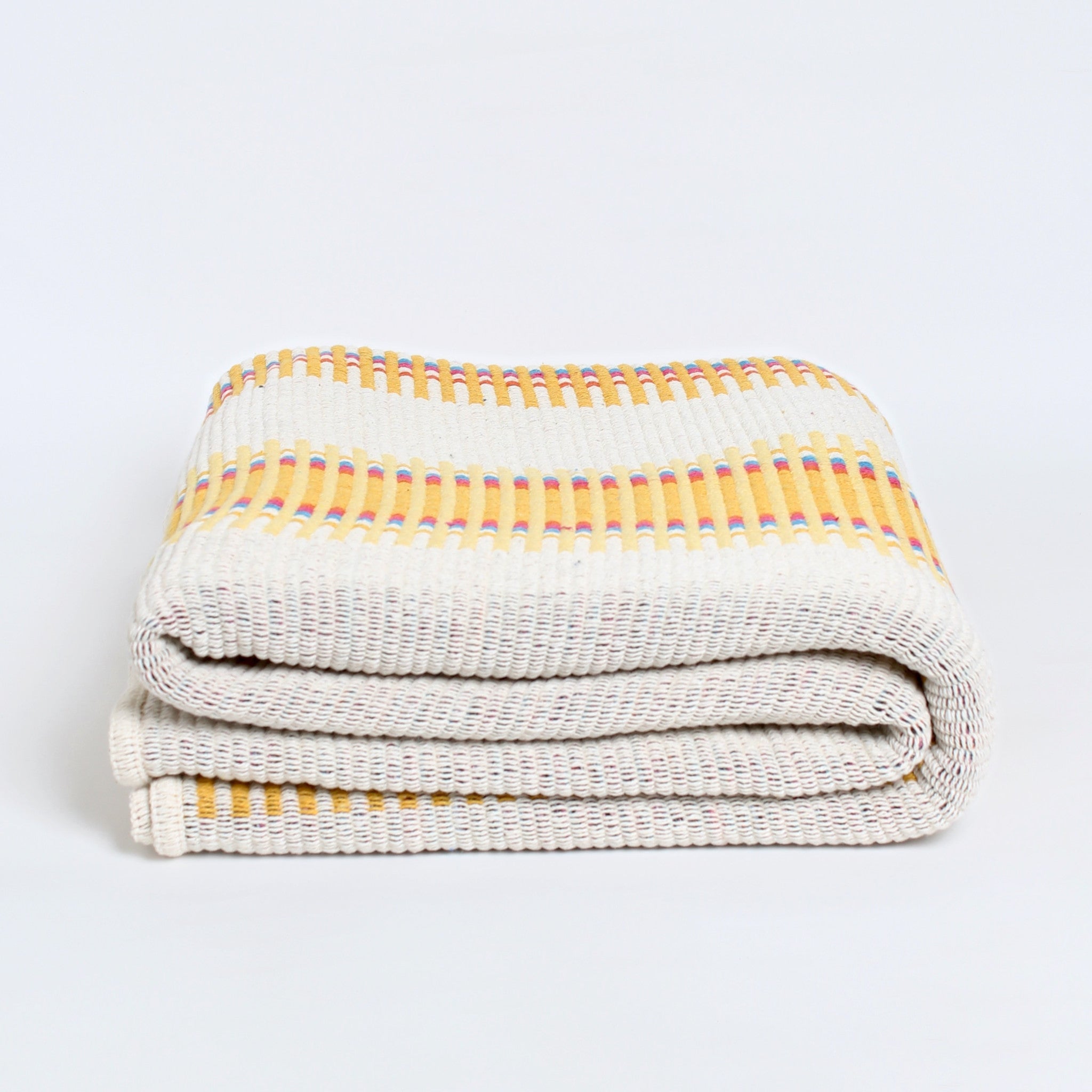 Portuguese recycled cotton throw blanket in yellow, beige, and orange, 140×210 cm — sustainable woven bed cover or sofa throw made on traditional looms