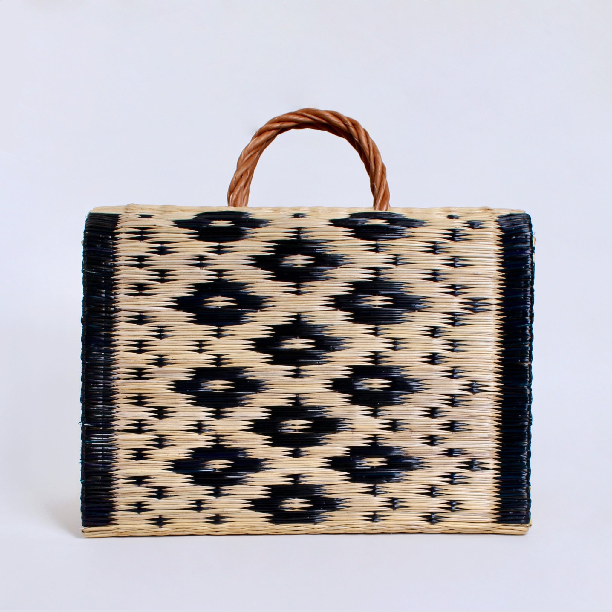 Handwoven reed basket with bold multicolor patterns — artisanal tote for market shopping, beach, or everyday use

