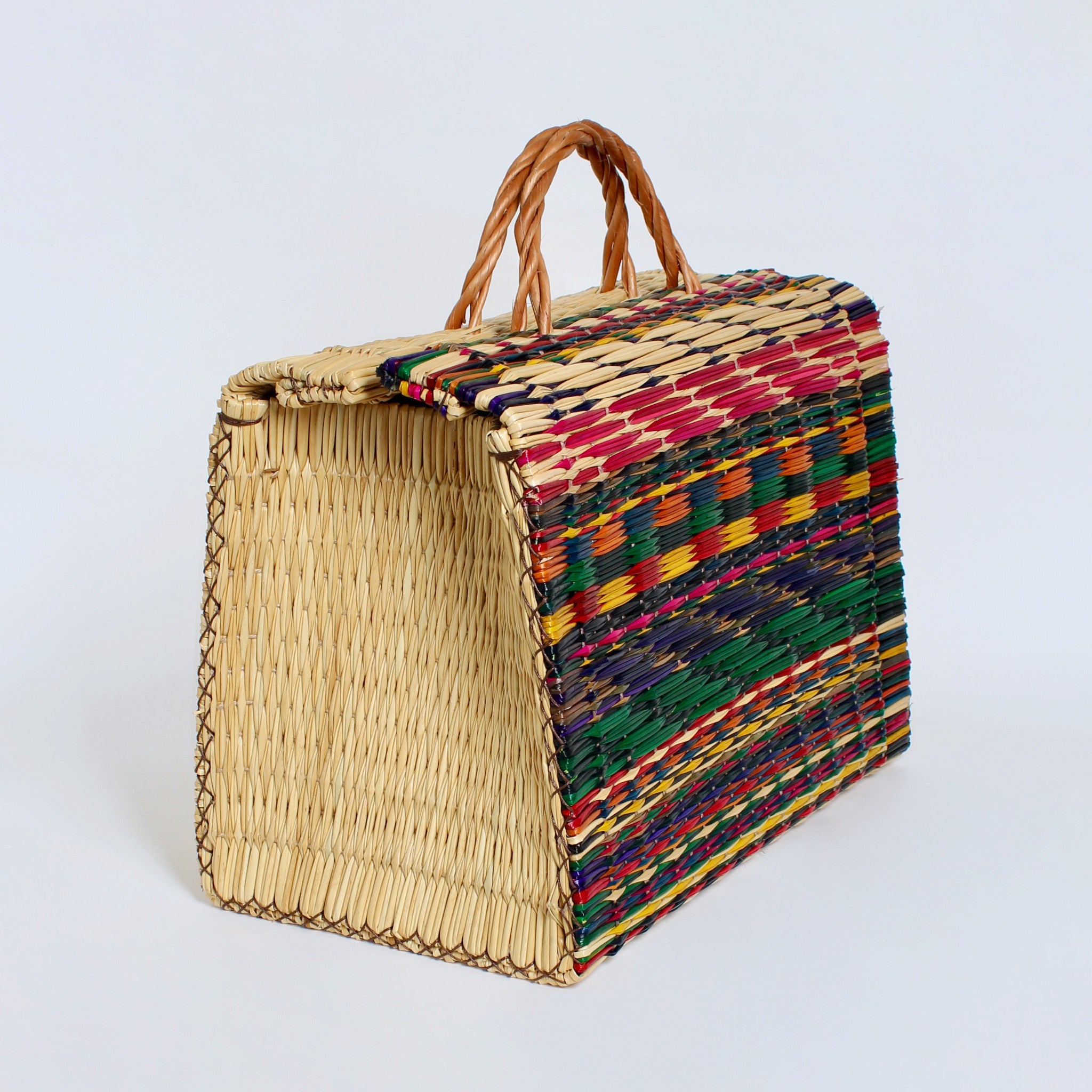 Handwoven natural reed basket with bold patterns — artisan carryall tote for shopping, beach, or everyday use