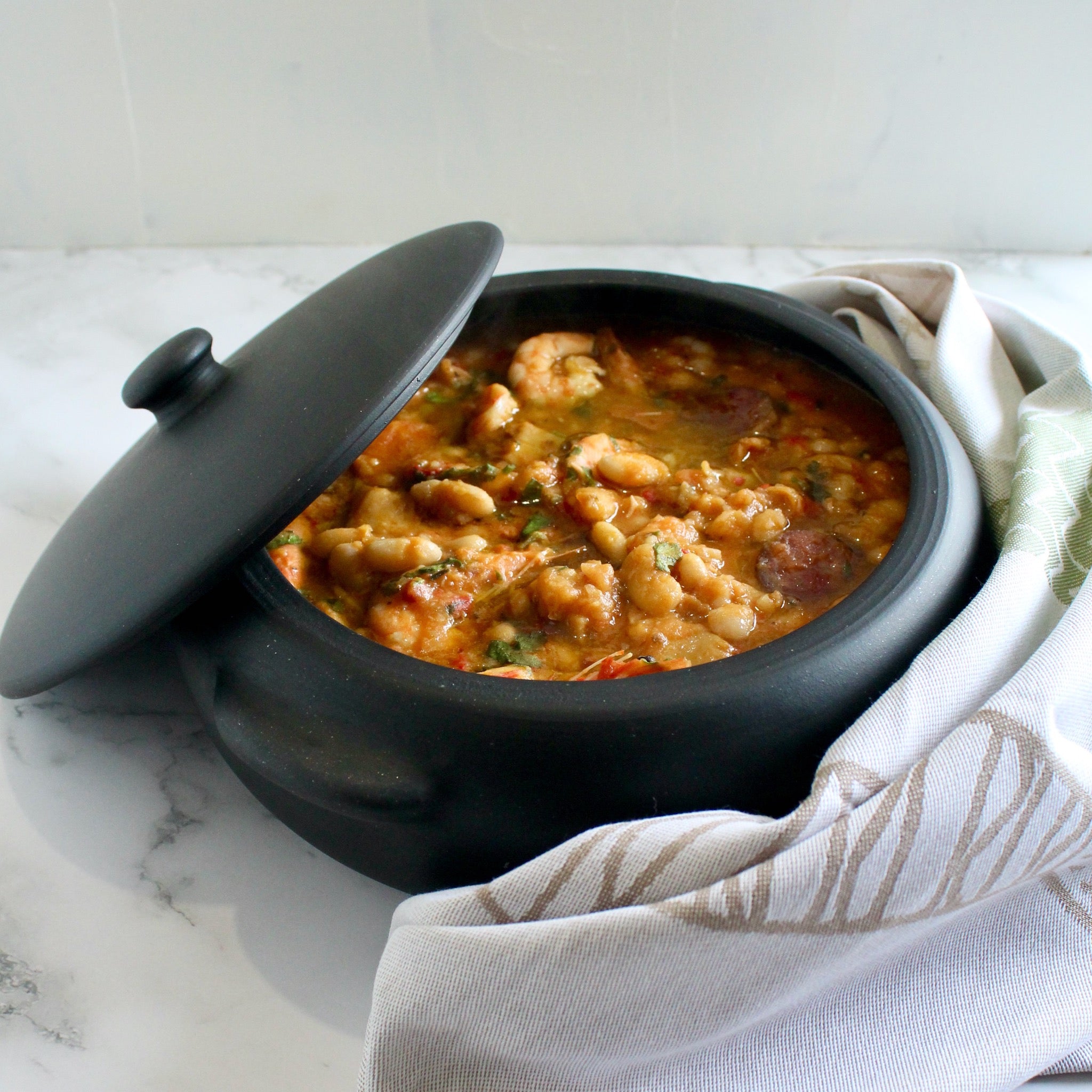 Handmade Portuguese black clay stew pot — natural unglazed terracotta casserole for slow-cooking soups, stews, and traditional recipes