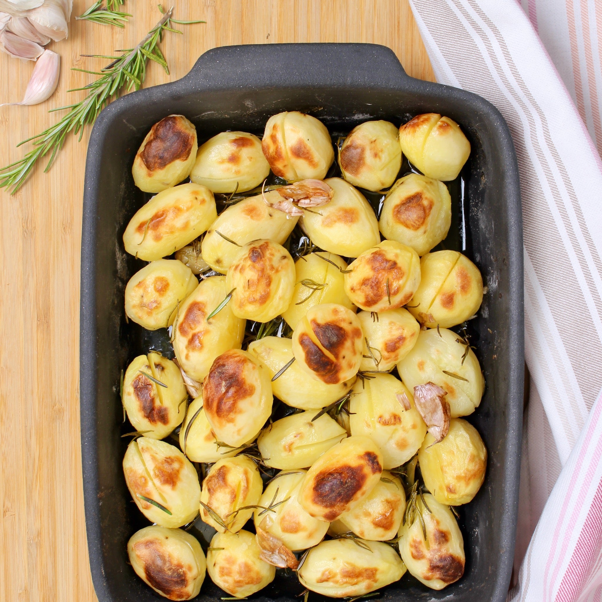 Handcrafted Portuguese black clay oven dish — large unglazed terracotta baking tray for rustic oven-to-table cooking and serving