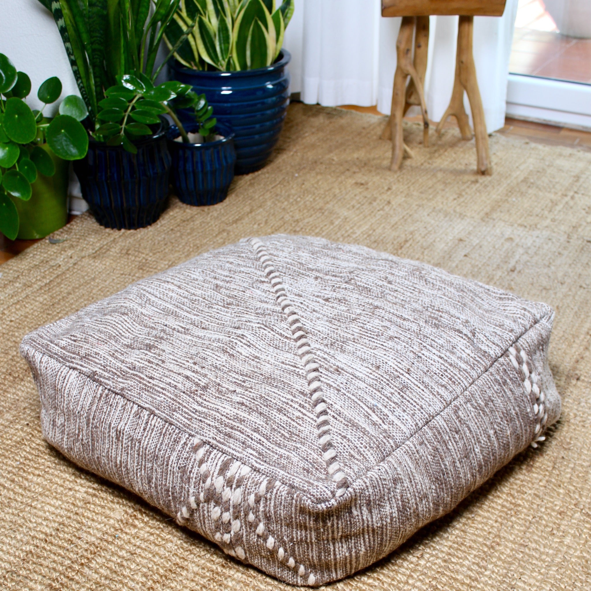 Beige and brown Moroccan wool pouf handcrafted from traditional Kilim rug, 60×60×20 cm artisan floor cushion with geometric patterns
