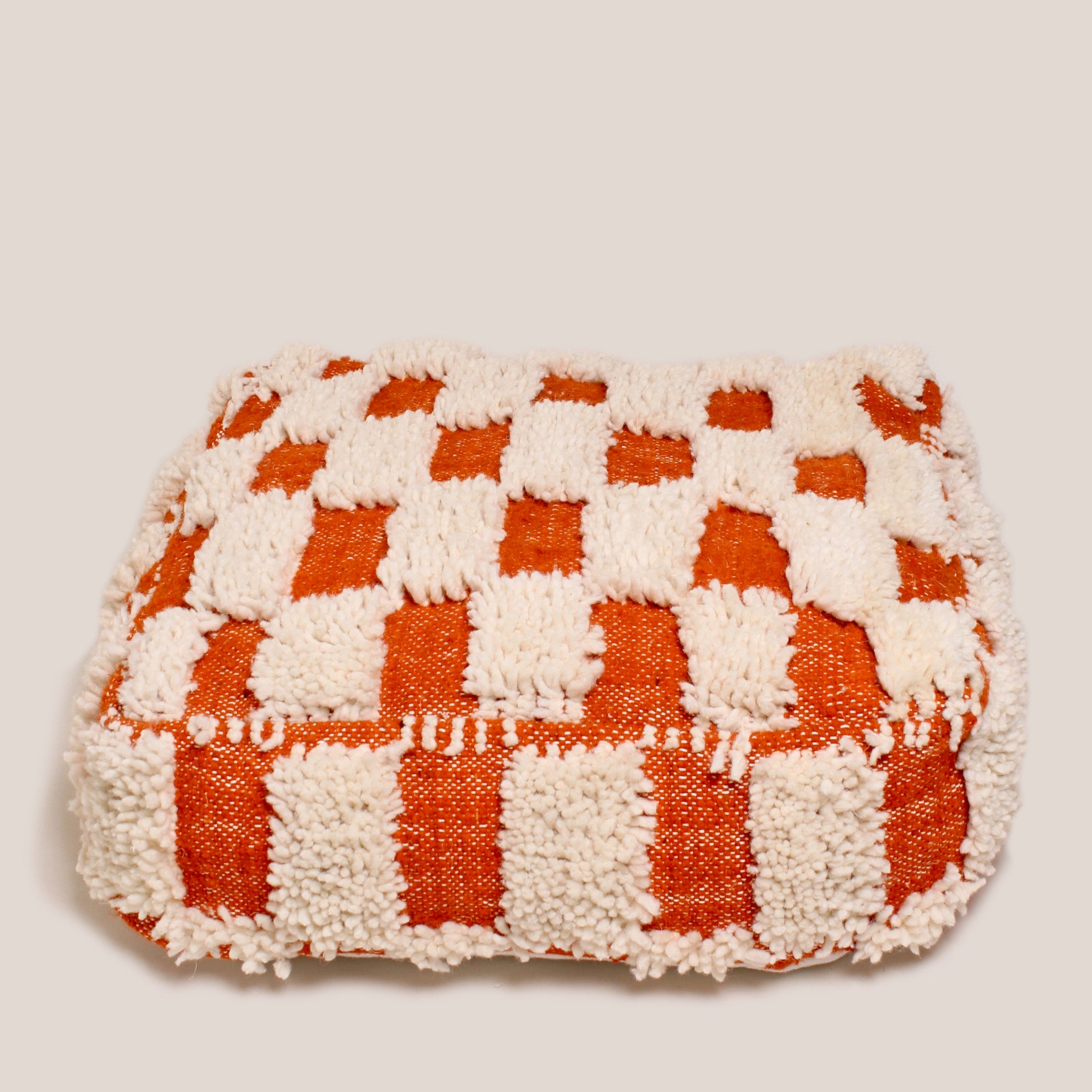 Beige and orange Moroccan wool pouf made from authentic Beni Ourain rug, 60×60×20 cm, handcrafted floor cushion with geometric design